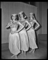 Carolyn Crane, Judy Mahood, and Alicia Mowat, ballet students, in costume, 1956