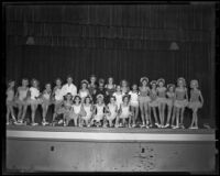 Students in a Mildred Beattie dance school in costume on a stage