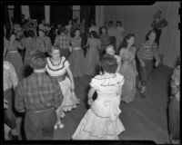 Square dancers changing partners, Mar Vista, 1950