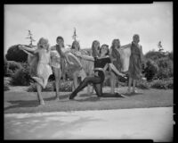 Ballet students of Julia Stuart in costume at a park, Santa Monica, 1956