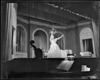 Opera singer Nelda Scarsella performing in “La Traviata” at the Wilshire Ebell Theatre, Los Angeles, 1951