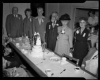 William H. Brown and wife with anniversary cake, Los Angeles, 1949