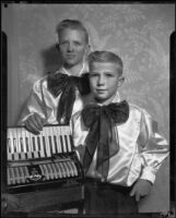 Portrait of the Musselman boys with accordion, 1950