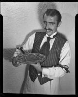 Gerald Johnson, dressed as an old fashioned bartender, Santa Monica, 1940