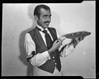 Gerald Johnson, dressed as an old fashioned bartender, Santa Monica, 1940