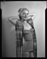 Marie Mulligan in a swim suit and shawl, Santa Monica, 1940-1950