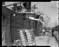 Cargo being unloaded from a ship at Long Beach Harbor, Long Beach, 1930