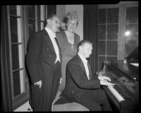 John Crown playing piano at a gathering, Santa Monica, 1952
