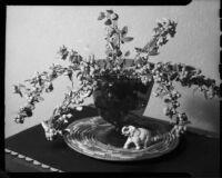 Vase of Christmas berry branches, probably Santa Monica, 1940-1945