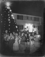 Santa Monica Civic Opera performers singing carols in a Christmas-themed photomontage, 1955