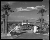 Helen Willard at the entrance drive to the La Paz Guest Ranch, Palm Springs, 1941