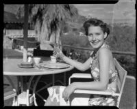 Helen Willard at an outdoor dining patio at the La Paz Guest Ranch, Palm Springs, 1941