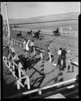 Spectators watching a harness race at the Palm Springs Field Club, 1937