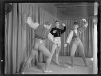 Three male ballet students of the Elena Vartova dance school posing in costume, (Santa Monica?), circa 1951