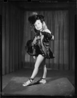 Little girl, student at the Elena Vartova dance school, posing in costume, (Santa Monica?), circa 1951