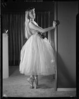 Ballet student of the Elena Vartova dance school posing in costume, (Santa Monica?), circa 1951