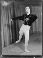 Male ballet student of the Elena Vartova dance school posing in costume, (Santa Monica?), circa 1951