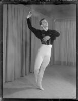 Male ballet student of the Elena Vartova dance school posing in costume, (Santa Monica?), circa 1951