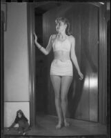 Shirlee Baker modelling a swim suit for Diana's Dress Shops, Santa Monica, 1951