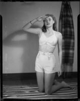 Shirlee Baker modelling a swim suit for Diana's Dress Shops, Santa Monica, 1951