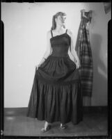 Shirlee Baker modelling a dress for Diana's Dress Shops, Santa Monica, 1951