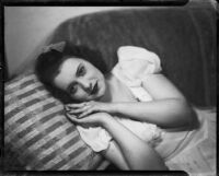 Bonnie Gerhardy reclining on a pillow, Santa Monica, 1943