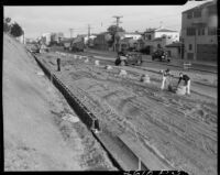 Workers widening Roosevelt Highway, Santa Monica, 1935