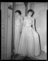 Diane Dali Kortz standing in the dressing room of a house, (Santa Monica ?), 1954