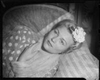 Evelyn Most reclining on a pillow, Santa Monica, 1944