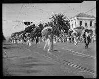 Ladies with parasols and caballeros in the California Admission Day Parade, Santa Monica, 1937