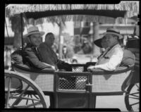 John F. Dockweiler, Irvin S. Cobb, and Philip T. Hill in a carriage at the California Admission Day parade, Santa Monica, 1937