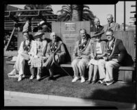 Native Sons of the Golden West officials seated on the Louis B. Mayer Memorial Bench, Palisades Park, Santa Monica, 1937