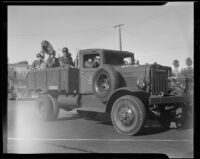 Cargo truck carrying a military brass band during the Armistice Day parade, Santa Monica, 1938