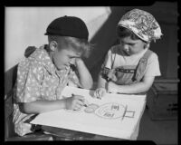 Boy and girl drawing a picture at the Children's Home Society, Los Angeles, 1935-1960