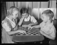 Children playing checkers at the Children's Home Society, Los Angeles, 1935-1960