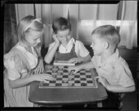 Children playing checkers at the Children's Home Society, Los Angeles, 1935-1960