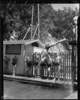 Caroline Bartlett diving into a pool at Matilija Hot Springs, Matilija Canyon, Ojai vicinity, 1940s