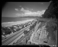 View towards cliff side of Palisades Park and houses along Santa Monica Beach, 1947 to 1952