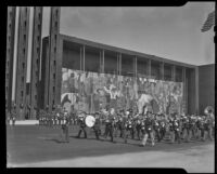 Military band procession outside the Federal Building, Golden Gate International Exposition, San Francisco, 1939
