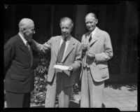 Charles B. Hervey and 2 men outside El Mirasol Hotel shortly after he became the owner, Santa Barbara, 1941