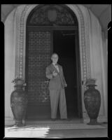Charles B. Hervey at the entrance to El Mirasol Hotel shortly after he became the owner, Santa Barbara, 1941
