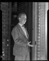 Charles B. Hervey at the entrance to El Mirasol Hotel shortly after he became the owner, Santa Barbara, 1941