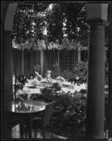 Woman in the patio of El Mirasol Hotel, Santa Barbara, 1941