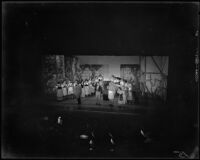 Nineteen women and 3 men on stage during a performance of "The Student Prince" at Barnum Hall, Santa Monica, 1952