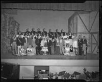 "Student Prince" cast members in costume on stage, Barnum Hall, Santa Monica, 1952