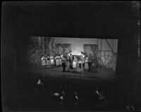 Nineteen women and 3 men on stage during a performance of "The Student Prince" at Barnum Hall, Santa Monica, 1952