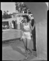 Unidentified girl posing at El Mirador Hotel pool, Palm Springs, 1941