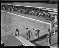 Young boys and girls diving into El Mirador pool, Palm Springs, 1941