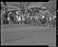 Girls in western outfits on bicycles in the Desert Circus Parade, Palm Springs, 1941