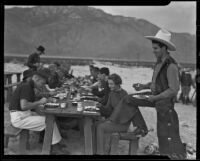 Vacationers in the desert enjoy breakfast with The Desert Riders, Palm Springs vicinity, 1936